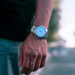 About Stylish wristwatch on a man's hand outdoors in Gujranwala, capturing the essence of luxury and time.